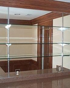 Mirrored wall with shelves