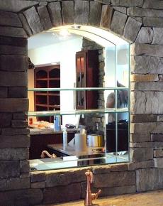 Mirrored alcove in wall